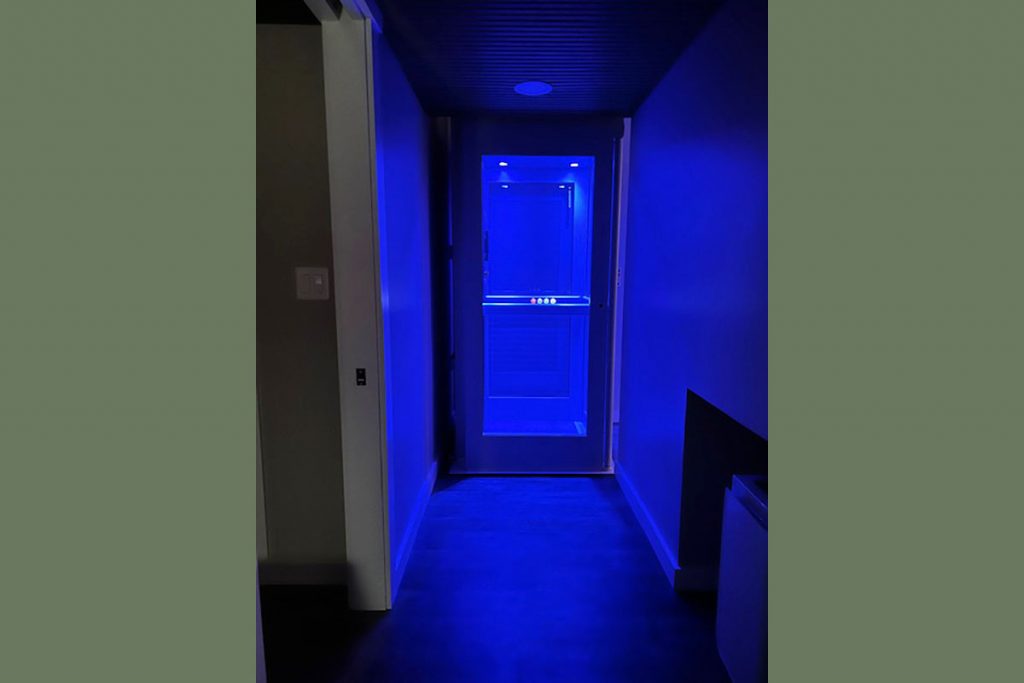 St. Albans, VT Basement Transformation (AFTER) Blue Mood Light Elevator
